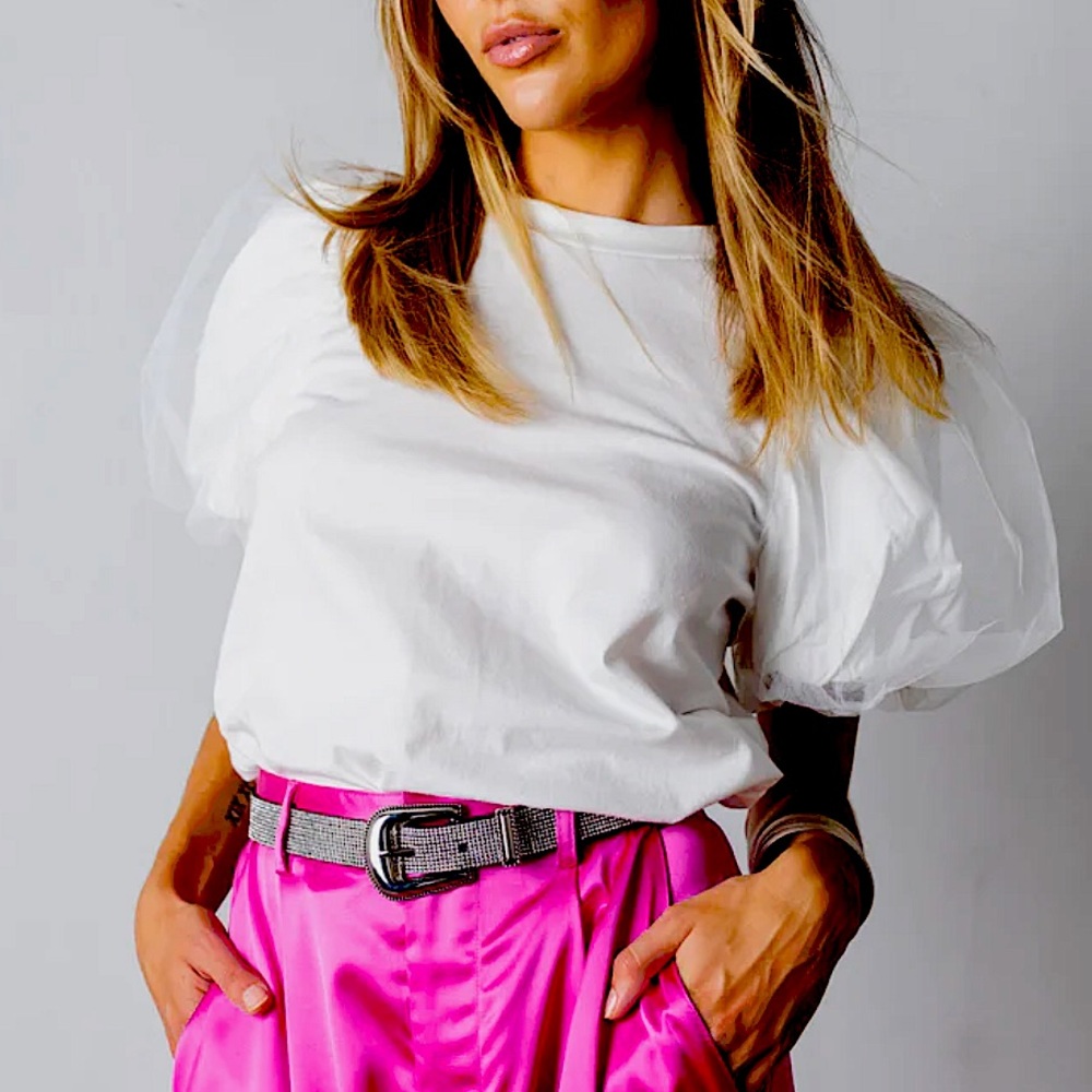Size Small, White “A Little Drama” top featuring puff sleeves with a loose fit